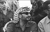 The Palestine Liberation Organization (PLO) chairman Yasser Arafat attends a ceremony marking the end of a military training, August 17, 1970. Yasser Arafat founded the Palestine Liberation Movement or Fatah in Kuwait in 1959 and gained control over the PLO in 1969. STF / AFP