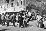 A picture dated 22 November 1945 shows President Bishara al-Khoury saluting the Lebanese flag during the first Lebanese military Parade at Beirut's martyrs square after the withdrawal of French troops from Lebanon. SAMI SOLH ALBUM / AFP