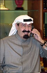 Picture taken in May 2002 shows crown Prince Abdullah talking on the phone at his palace in Riyadh. The popular crown prince has been named ruler of the world's top oil exporter following the death 01 August 2005 of his half-brother King Fahd. AFP PHOTO/AMMAR ABD RABBO